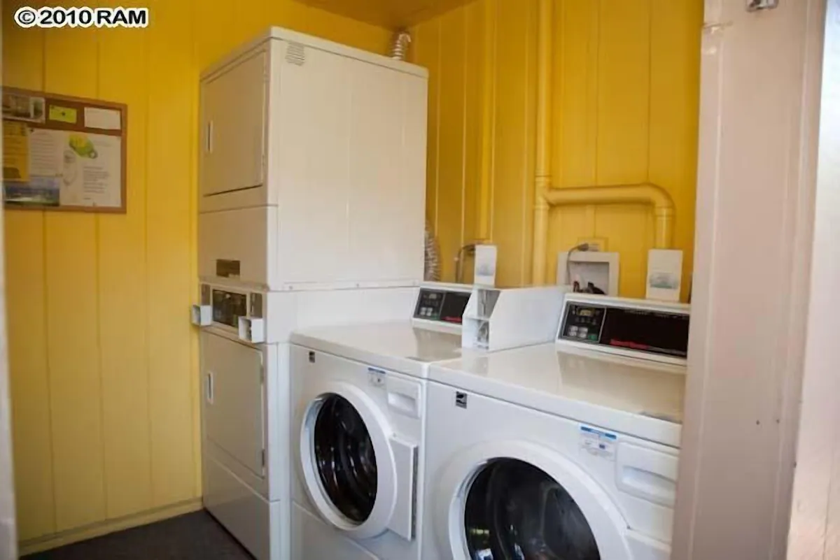 A white washer and dryer in a room.