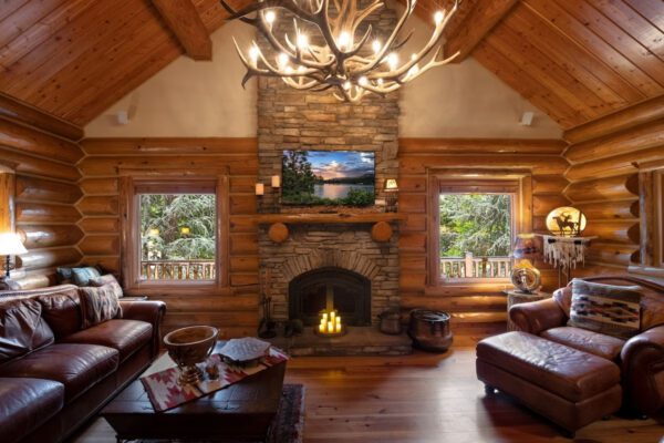 A living room with a fireplace and couches