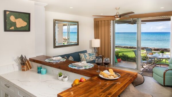 A living room with a table and a window